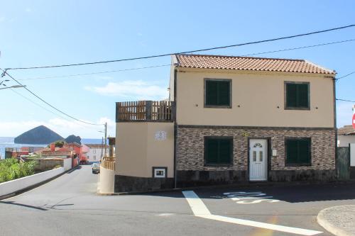 a building on the side of a street at House 37North in Mosteiros