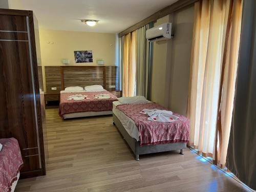 Selinus Beach Club Hotelにあるベッド