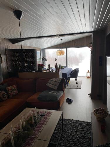 Posezení v ubytování Gammel Lans by Norgesbooking - lovely cabin in Trysil