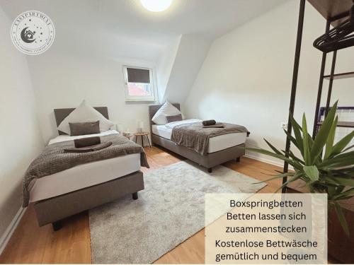 Postel nebo postele na pokoji v ubytování Easypartment am Pfälzer Wald nähe Outlet Center Zweibrücken