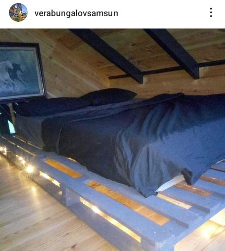 a bed sitting on the floor in a room at HAMZAOĞLu KONAK in Atakum