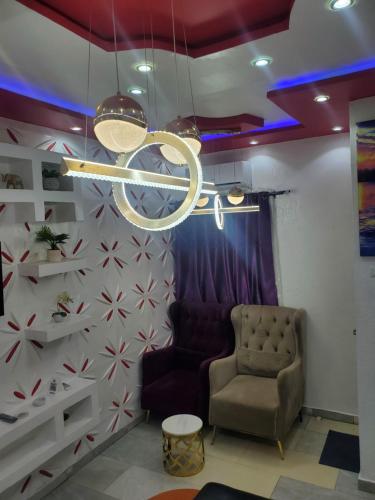 Χώρος καθιστικού στο TOUR EIFFEL HoTEL BENIN