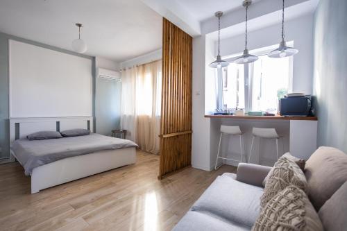 En eller flere senge i et værelse på 1Bed Flat Central Bucharest