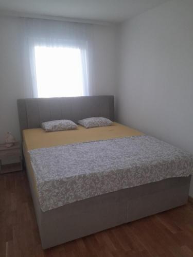 Llit o llits en una habitació de Stan na dan Doboj
