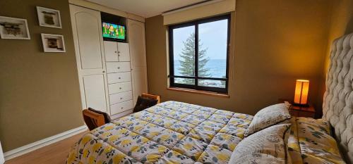 Postel nebo postele na pokoji v ubytování Departamento en la puntilla villarrica