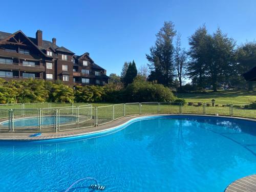 Bazén v ubytování Departamento en la puntilla villarrica nebo v jeho okolí