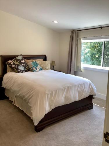 a bedroom with a large bed with a window at Riva Loft with a View in Riva