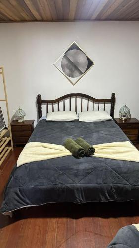 Postel nebo postele na pokoji v ubytování Casa linda e muito aconchegante em Campos do Jordão