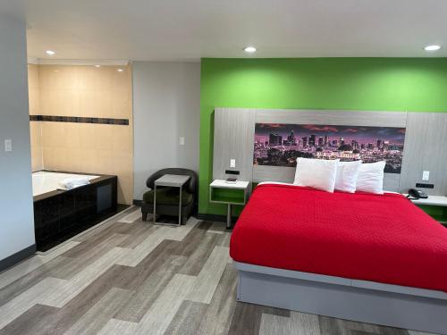 Ένα ή περισσότερα κρεβάτια σε δωμάτιο στο Garden Inn San Gabriel