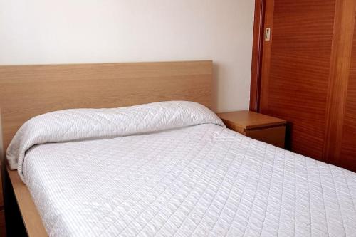 Katil atau katil-katil dalam bilik di Apartamento Faisca
