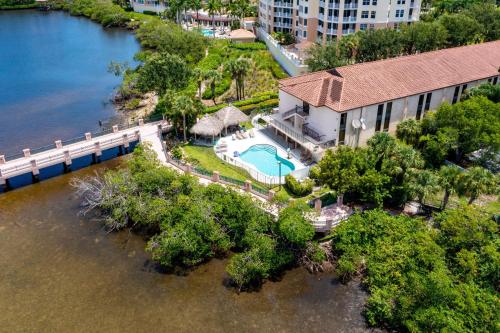 an aerial view of a house with a bridge over water at Best Western Intracoastal Inn in Jupiter