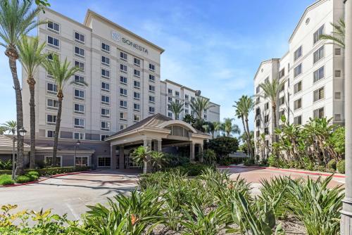 a rendering of the exterior of a hotel at Sonesta Anaheim Resort Area in Anaheim