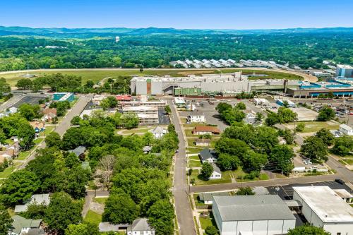 an aerial view of a city with trees and buildings at A Touch of Modern in Hot Springs