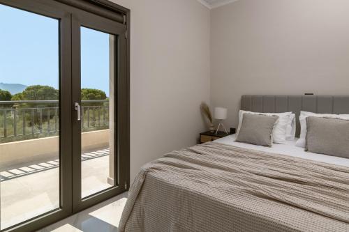 Ένα ή περισσότερα κρεβάτια σε δωμάτιο στο Altane Villa