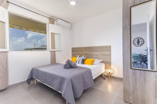 Postel nebo postele na pokoji v ubytování Navira - Appartement Villa Real