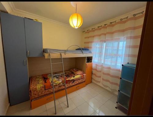 Ένα ή περισσότερα κρεβάτια σε δωμάτιο στο Appart face au grand stade de Tanger