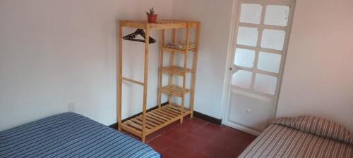 Postel nebo postele na pokoji v ubytování Hostal Zipolite Melchor Ocampo