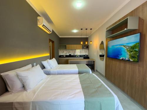 Postel nebo postele na pokoji v ubytování Ondara Flat Hotel