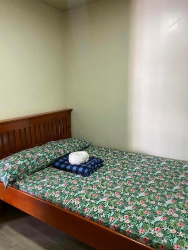 Postel nebo postele na pokoji v ubytování TLCS - Hearth&Home Baguio City