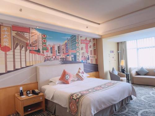 a hotel room with a bed and a painting on the wall at Baiyun Hotel Guangzhou in Guangzhou