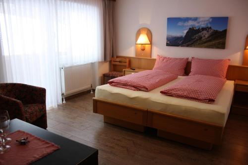 Posteľ alebo postele v izbe v ubytovaní Landhotel Wolf