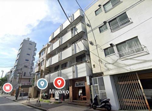a motorcycle parked in front of a building at Azabujuban Properties 401 - the sanctuary in Tokyo