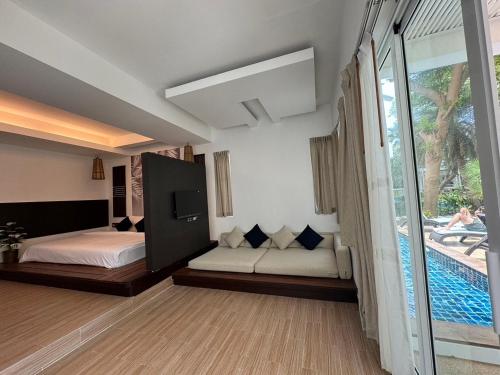 Postel nebo postele na pokoji v ubytování Koh Tao Montra Resort