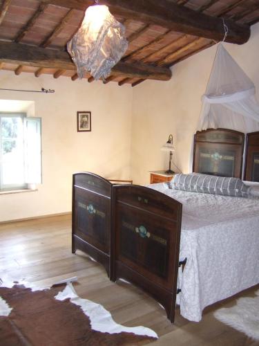 Ένα ή περισσότερα κρεβάτια σε δωμάτιο στο Villa Cicolina