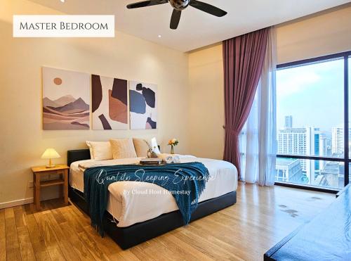 a bedroom with a bed and a large window at St Mary Kuala Lumpur Homestay Bathtub & Walk to Pavilion Bukit Bintang by Cloud Host in Kuala Lumpur