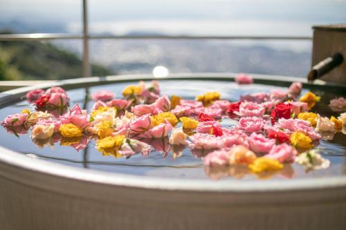 a bunch of flowers laying on top of a table at Tennomaru in Gamagori
