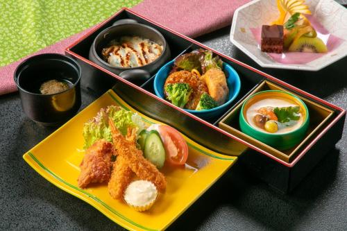 a tray of food with different types of food at Tennomaru in Gamagori