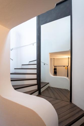 Кровать или кровати в номере LYFIE Apartments - XL Architekten Maisonette Wohnung - Straubing