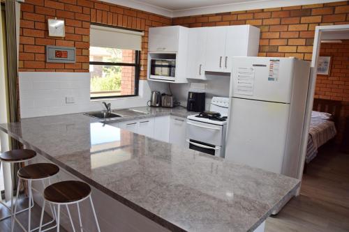Η κουζίνα ή μικρή κουζίνα στο Cameo Court Unit 7 - Bring your own linen
