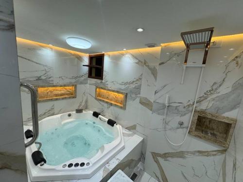 Baðherbergi á Solar de Pipa Vip Confort - Spa Hidro Flat