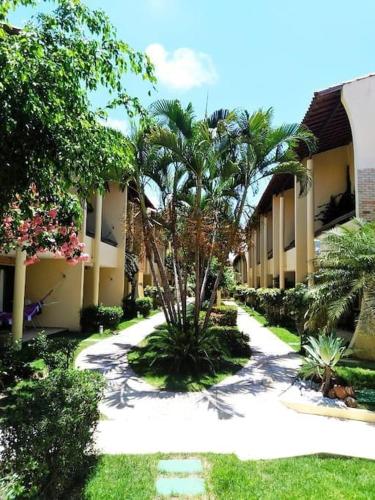 Un jardín fuera de Solar de Pipa Vip Confort - Spa Hidro Flat