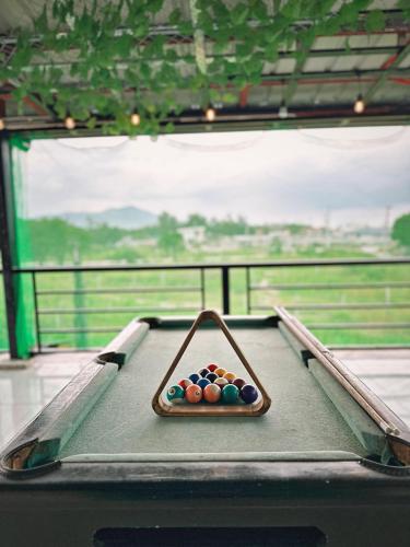 a tray of balls on a pool table at SimoyNorte Private Resort Beneg, Botolan, Zambales, Philippines in Zambales