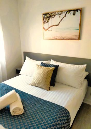 Ένα ή περισσότερα κρεβάτια σε δωμάτιο στο Bayview Motel