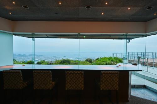 a bar with a view of the city at Tennomaru in Gamagori