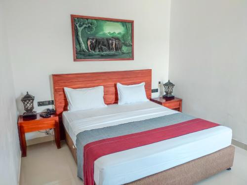 Ein Bett oder Betten in einem Zimmer der Unterkunft Hotel Elephant Park - NEW DEAL! Exclusive Offers on Pickups Available!