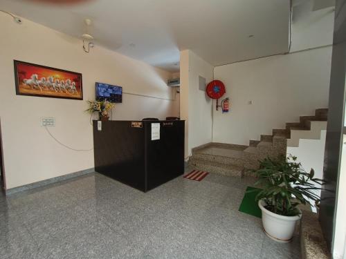 TV a/nebo společenská místnost v ubytování Hotel Mehra Inn