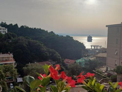 a view of the ocean and a ship in the water at B&B Casa Scotto in Savona