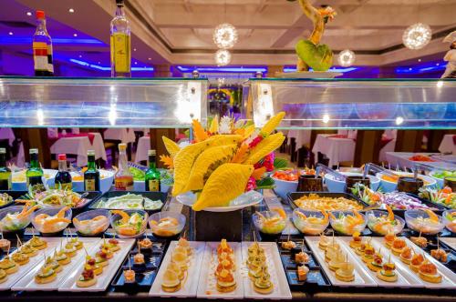 a buffet line with many different types of food at Marina Sharm Hotel in Sharm El Sheikh