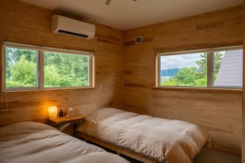 2023 Open 【Lake Toya】IWANKEにあるベッド