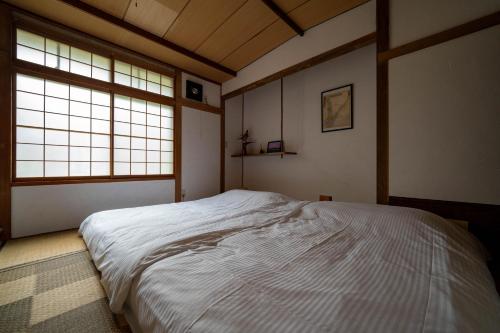 2023 Open 【Lake Toya】IWANKEにあるベッド