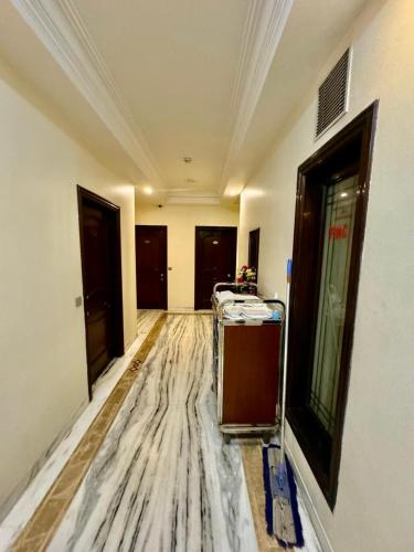 a living room with a marble floor and a room with a room at Hotel Florence Inn, Karol Bagh, New Delhi, 2 Min from Metro in New Delhi