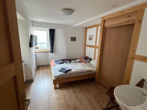 Postel nebo postele na pokoji v ubytování Haus Saaleradweg
