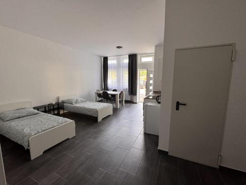 Postel nebo postele na pokoji v ubytování Cozy Apartment in Leverkusen
