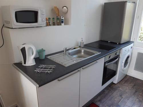 Photo de la galerie de l'établissement Guibert 19 F2 duplex, à Caudebec-lès-Elbeuf