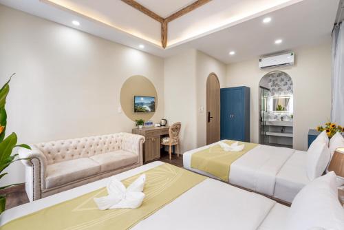 Postel nebo postele na pokoji v ubytování Jan Villa SaiGon Oasis