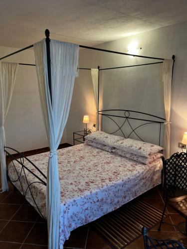Postel nebo postele na pokoji v ubytování Agriturismo Podere Forano